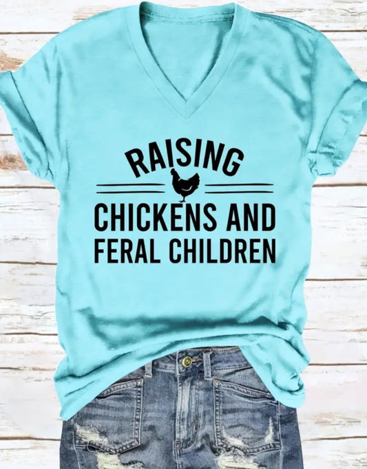 WOMEN'S T-SHIRT (Raising Chickens and Feral Children)